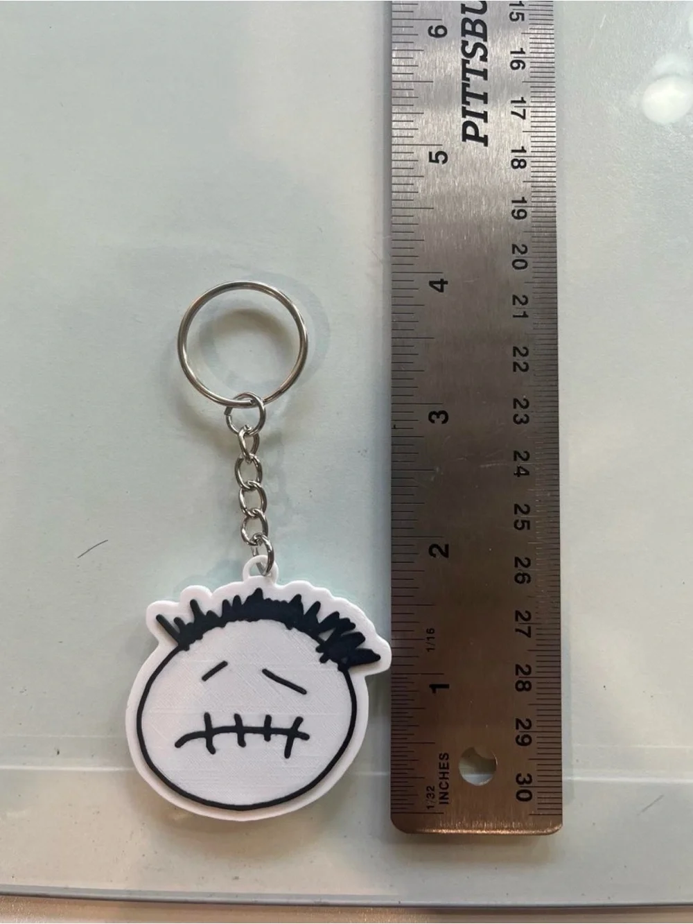 White & Black Sad Face Keychain with Metal Ring